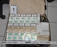 W lesie porzucono 1470 paczek papierosów pochodzących z przemytu (ZDJĘCIA)